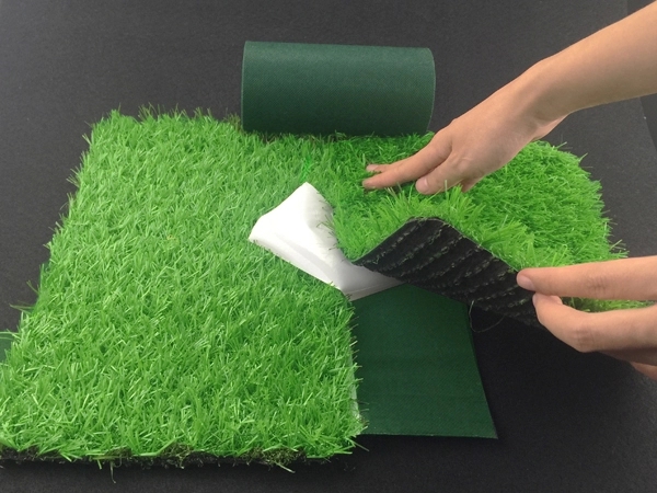 Artificial grass seam tape self adhesive with cut line release